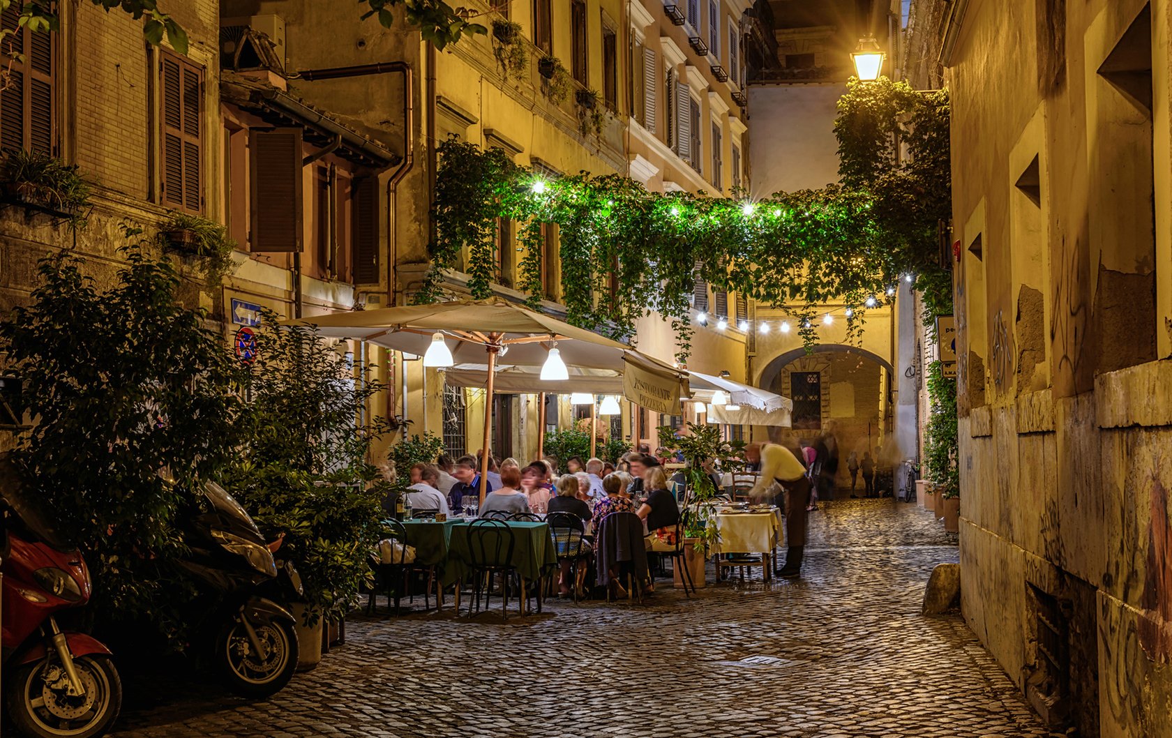 Outdoor restaurant at night in Trastevere